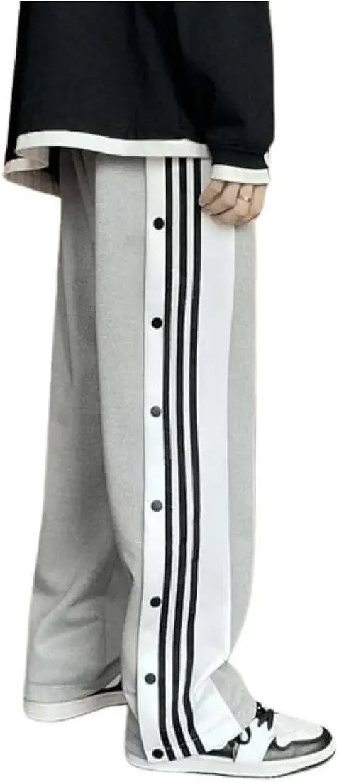 Black urban streetwear pants with side button detailing