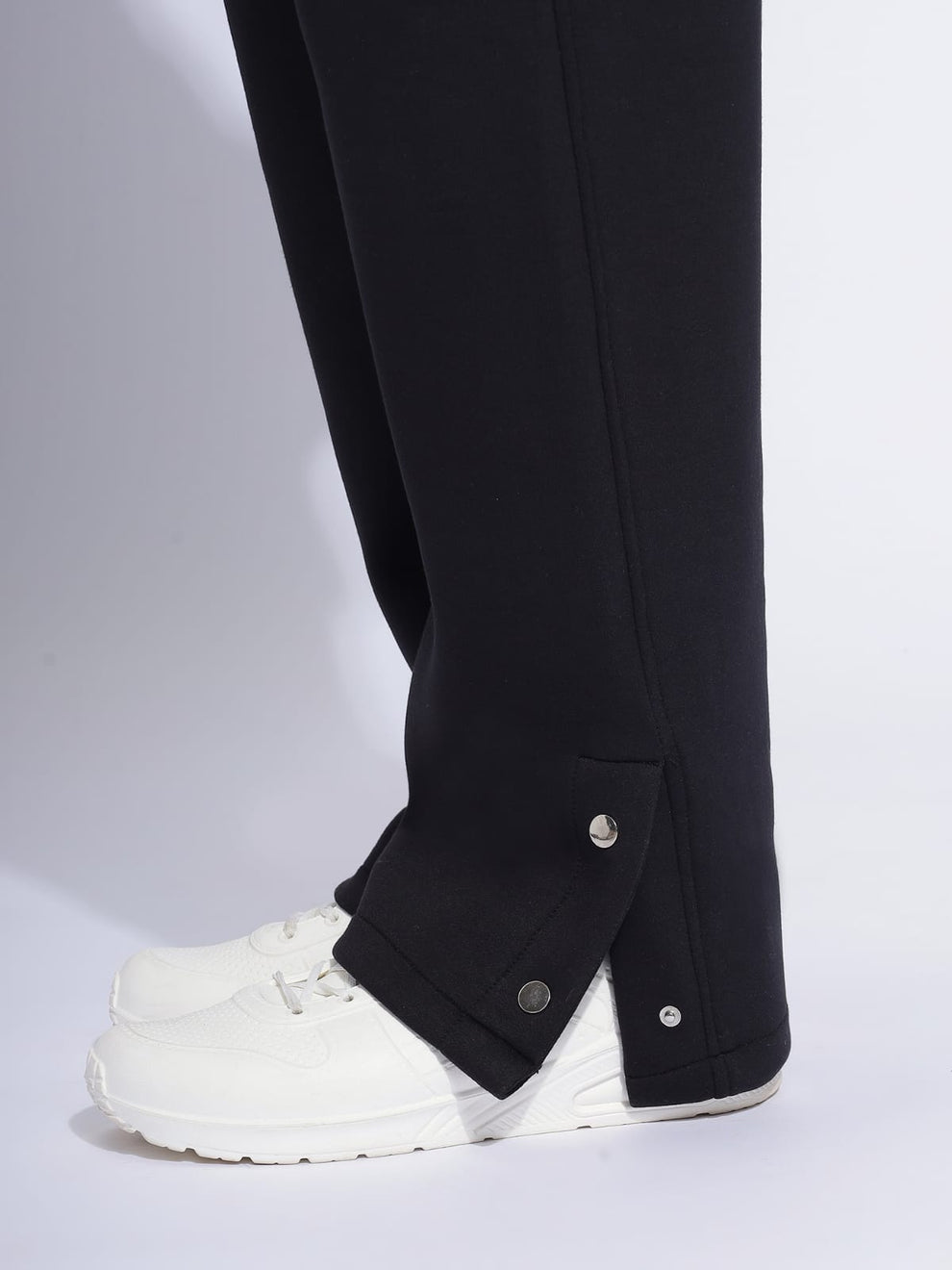 Heavy-Duty Black Cargo Pants with Snap-Button Detailing and Multi-Pocket Design