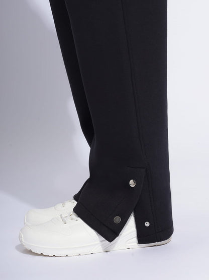 Heavy-Duty Black Cargo Pants with Snap-Button Detailing and Multi-Pocket Design