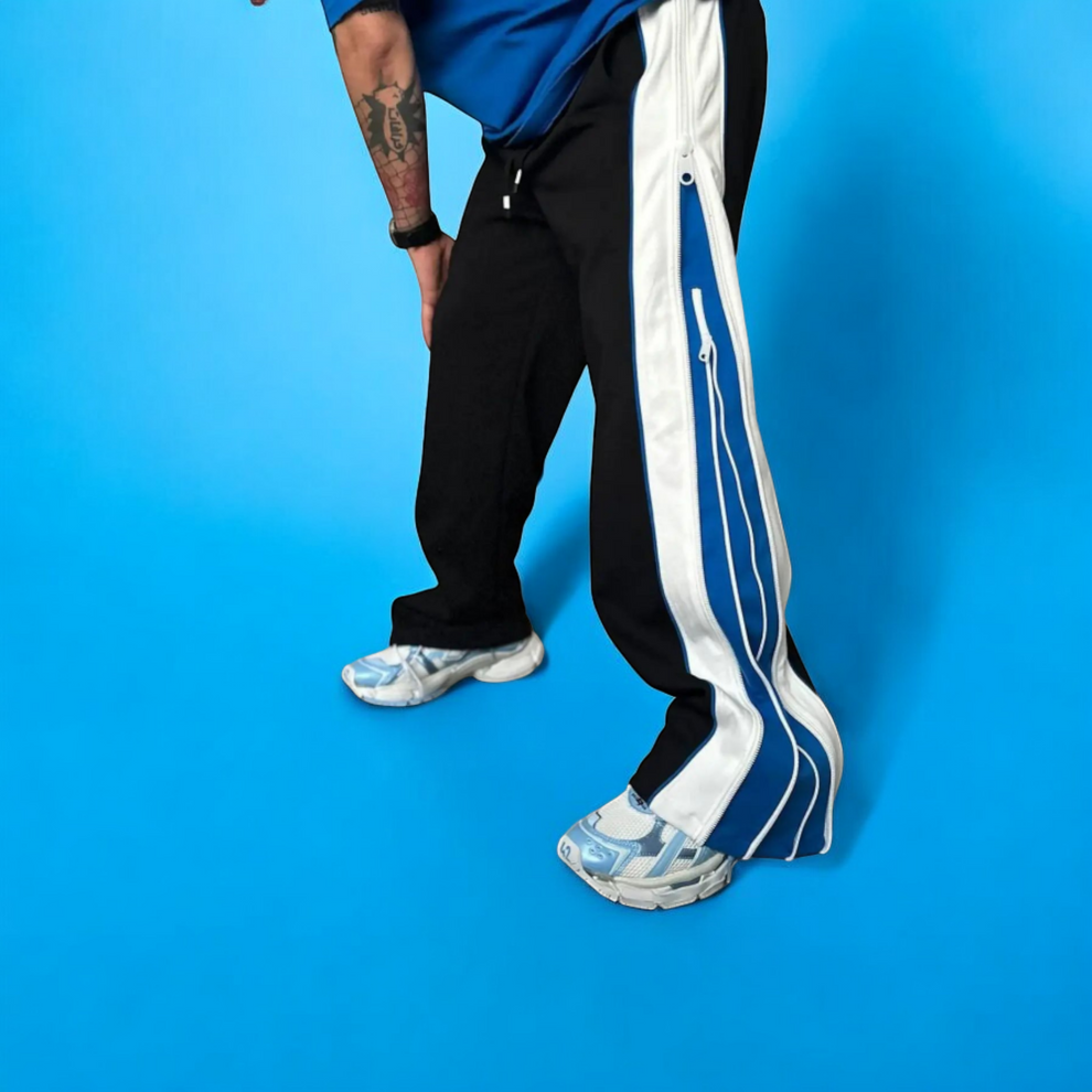Jipper Baggy Track Pant Wavy zip panels, oversized fit, bold color blocking. The original statement piece.