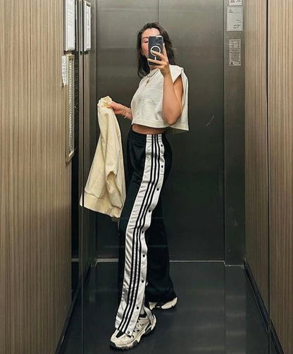 Unisex black streetwear pants with side snap buttons